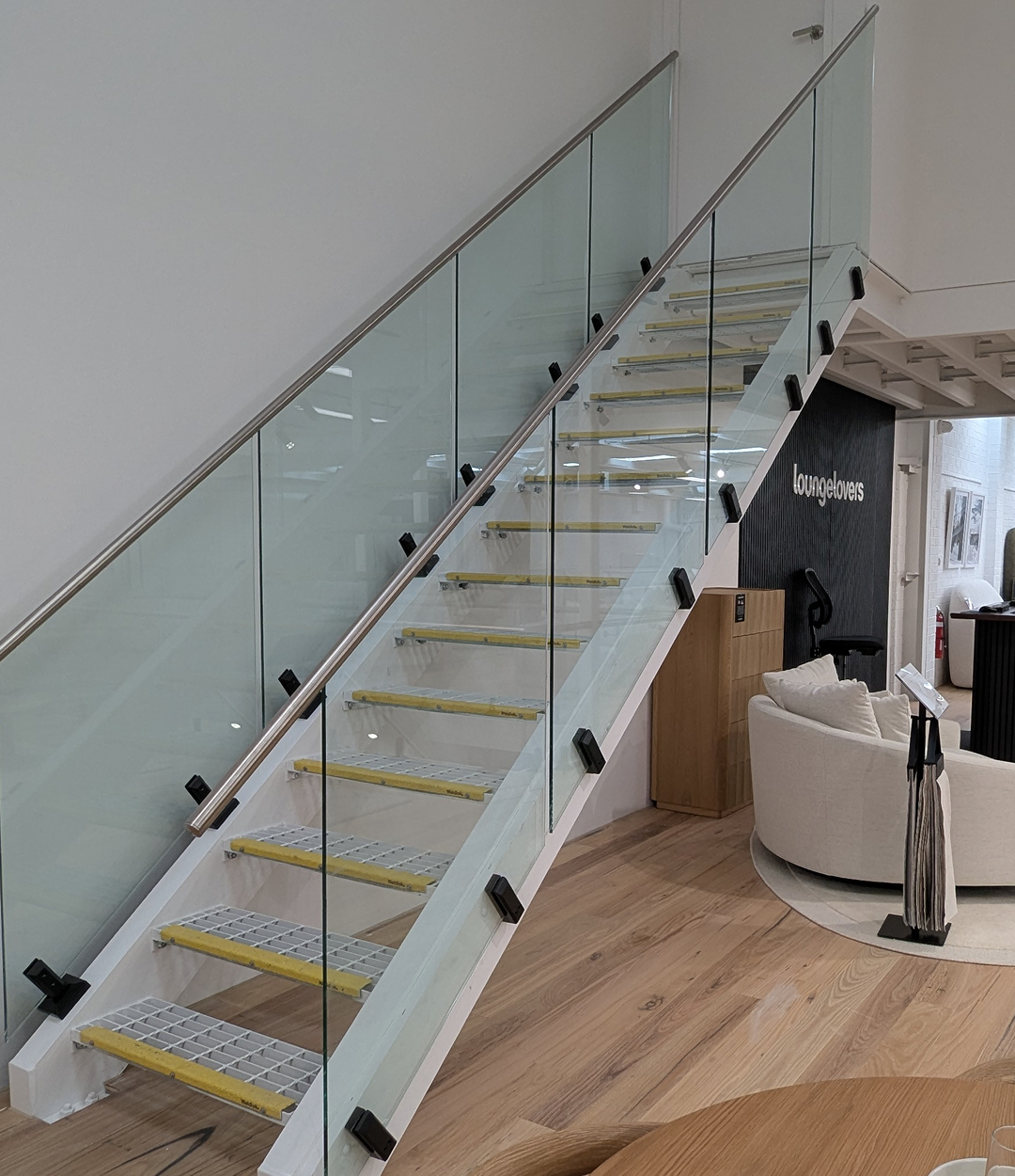 Glass balustrade with stainless steel handrail